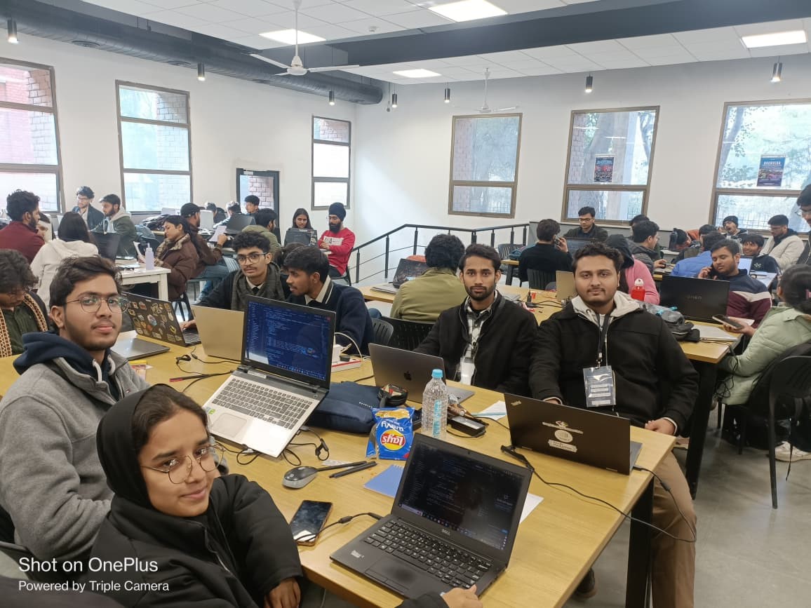 Team working together during the HackVeda hackathon